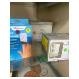 Stow Away Ironing Board Light Kit Pulse Oximeter and an Electric Sprayer