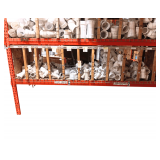 Sorted Shelf Of Medium PVC Fittings