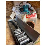 A Set of Asian Sockets and a Makita Palm Sander