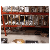 Sorted Shelf Of Medium PVC Fittings