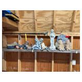 Shelf Of Yard Statues
