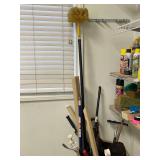 Barrel Of Cleaning Tools. Umbrellas