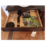 Drawer Of Manual And Electric Wine Bottle Openers