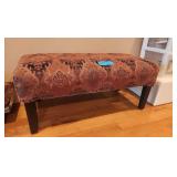 Kilim-style upholstered wooden accent bench featuring a tribal or bohemian rug pattern. 37 x 30 x 16