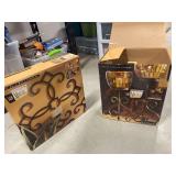 A Set of Sam Miguel Wall Sconces with a Set of Pillar Holders