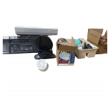 2 Boxes of Various Colors of Tape, AM FM Radio, and a Box of Path-Way Lights