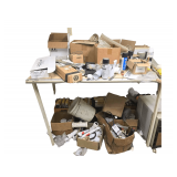 Contents on Table - Various Hardware - Batteries - Flags - Paint - Tools and More