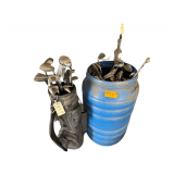 Drum of Golf Clubs and Bag of Clubs