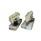 Sewing Machine Table and 2 Sewing Machines on top with Cases - Singer and Brother