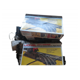 Box of Lionel Tracks and Accessories