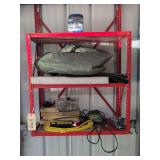 Contents of Shelf Including, 2 Tarps, Screws, Battery Tender, Multi plug, Steel Wool, etc.