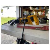 Electric DeWalt Sawzsll with a New Pack of Blades