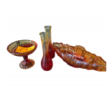 Amberina or iridescent carnival glass gondola / canoe bowl, often produced by mid-century makers like Jeannette Glass