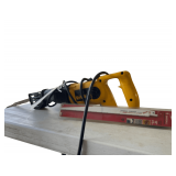 Electric DeWalt Sawzsll with a New Pack of Blades
