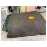 Numerous Rugs To Place by Work Benches 3