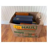 box containing small wooden box storage, bible, books, etc.