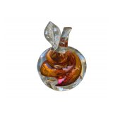 Handcrafted art glass apple paperweight with an amber and brown internal swirl, possibly made by Polish glass artist Marian Pyrcak.