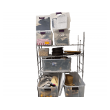 Contents of Shelf - Bins Full of Decorative Items - Chargers - Catering Themed Supplies