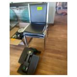 A Cubii Eliptical Exercise Machine and 2 Chairs