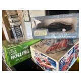Drawer of 4 Plastic Model Cars and 10 Diecast Model Cars