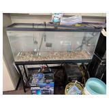 2 Approximately 55 Gallon Aquariums w Stands Filters and Associated Paraphernalia Including Coral and Aquarium Decor