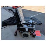 Quantum 6000 XL Powered Wheelchair. Runs and Moves. Left Arm needs Repaired. Comes with Paperwork, Charger and 2 Covers.