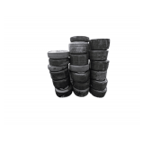 Assortment of Golf Cart Tires with and without Rims, Varying Conditions, Some with holes/water.