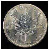 2011 MAPLE LEAF 1 OZ .999 SILVER ROUND