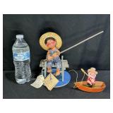 Annalee Boy Fishing off Dock & Fishingman in Boat