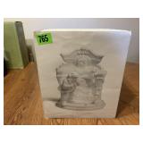 Santa by Fireplace Statue