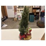 Winnie the Pooh in Santa Suit by Tree