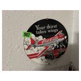 Round "Your Thirst Takes Wings" Coca Cola Sign