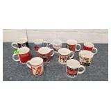 Several Coca-Cola Mugs