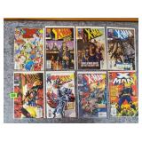 Several X-Man Comic Books