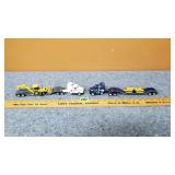 (2) Semis w/Machinery Trailers w/Deere Constructin