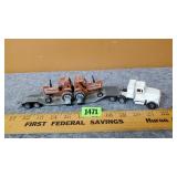 Semi w/ 2 Hesston Tractors on Trailer