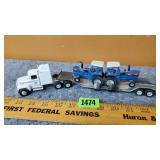 Semi w/ 2 Ford Tractors on Trailer