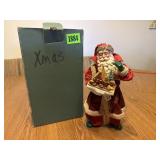 Santa with Gingerbread House Sculpture