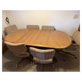 Nice Dining Table & 6 Rolling Chairs