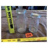 2 Small Embossed Milk Bottles
