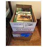 2 Boxes of Green Magazines