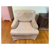 Beige Stuffed ChairLarge Wall Mirroe