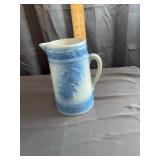 Blue and White Stoneware Pitcher With Relief