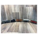 Tin Lionel 5 piece train set (engine, caboose, and