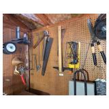 Wall Contents: Hedge Trimmers, Saws, Hammer, Fan