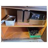 Cupboard Contents: Saber Saw,  Stereo