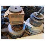 Barbell Weights and Grinding Stones with bar