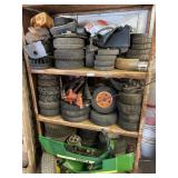 3 Shelves- Mower tires and misc. parts for mowers