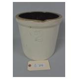 2 Gallon Stoneware Crock. Has a chip at the top