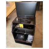 Wiwi Gaming Set on Shelf  TV has DVD Slot